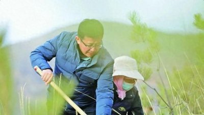 ​将责任和担当书写在青山绿水间